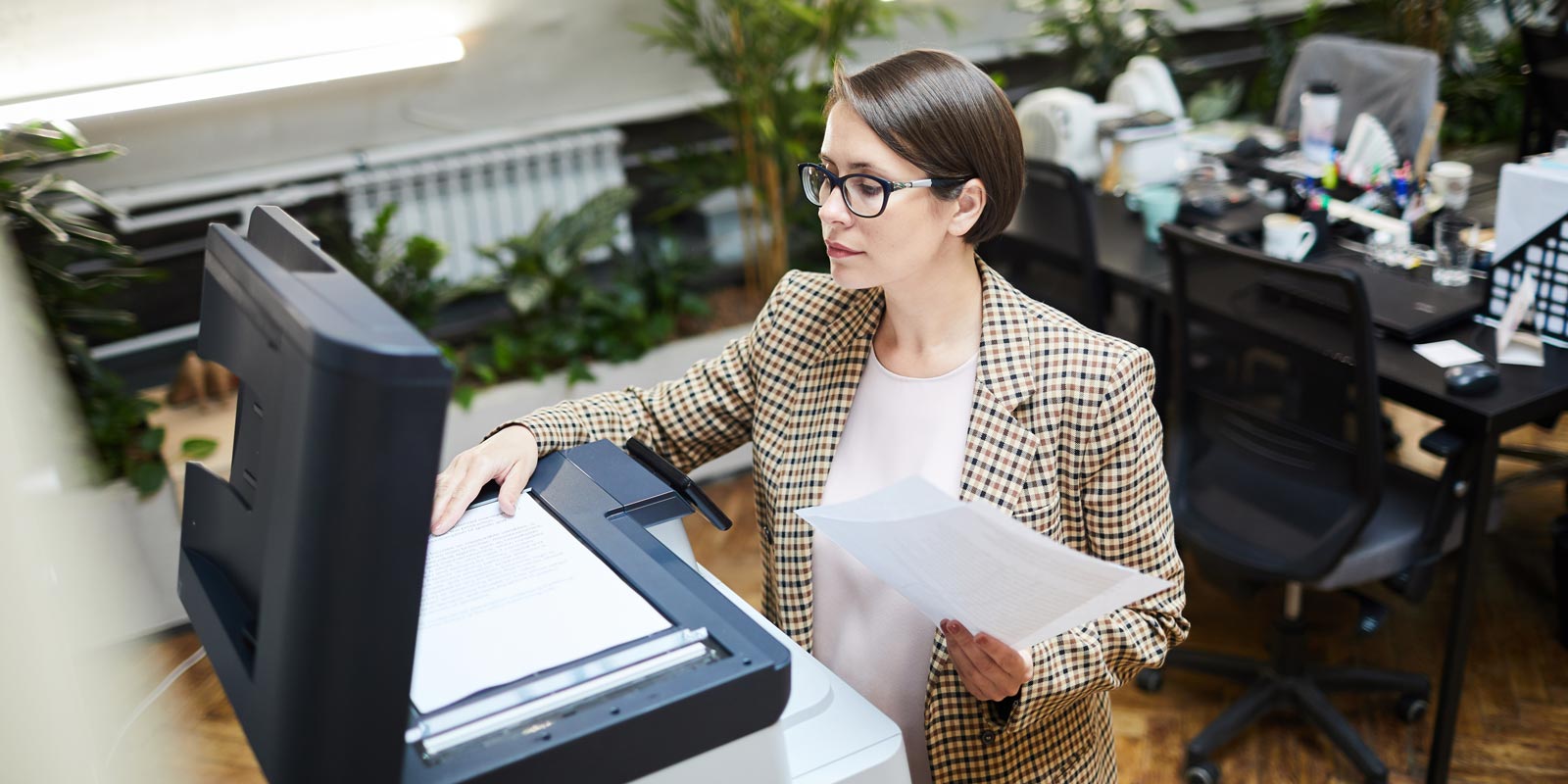 Woman using a printer